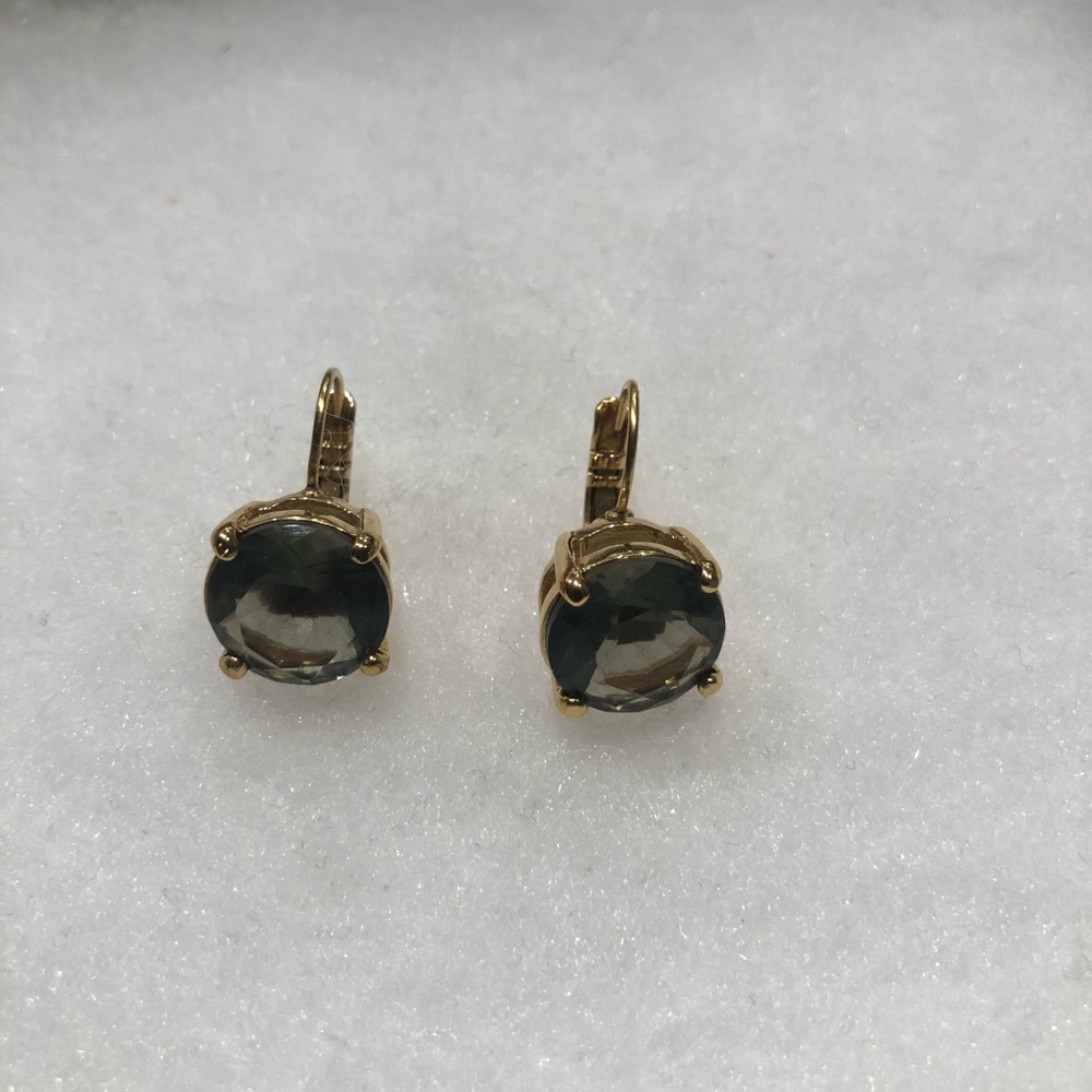 Gold lever back earrings with pale green crystal.